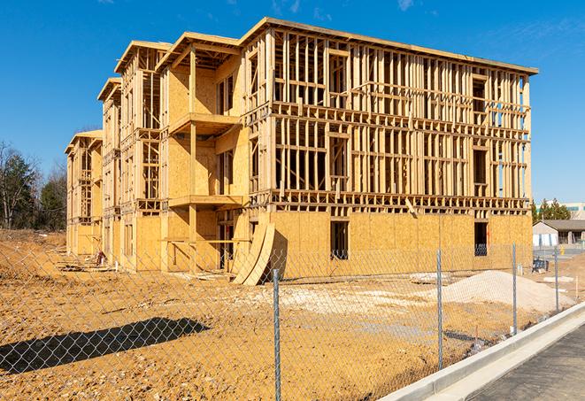 a close-up of temporary chain link fences, keeping the construction area safe and secure in Ontario, CA